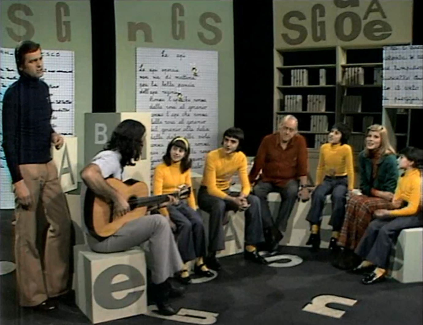 Sergio Edndrigo, Toquinho, Vinicius de Moraes, Marisa Sannia e 4 giovani coristi in uno studio della TV svizzera.