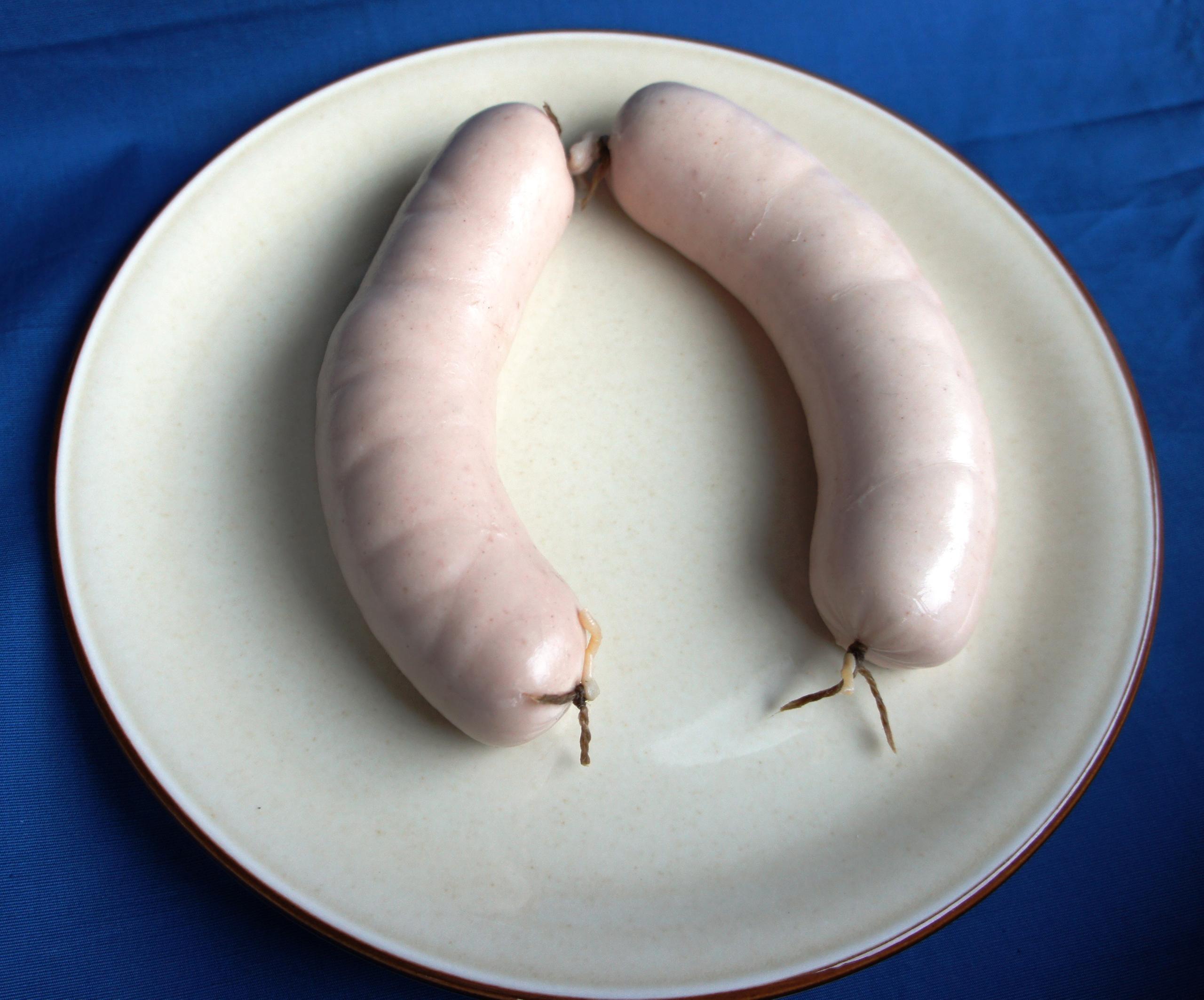 A pair of uncooked Appenzeller Siedwürst sausages