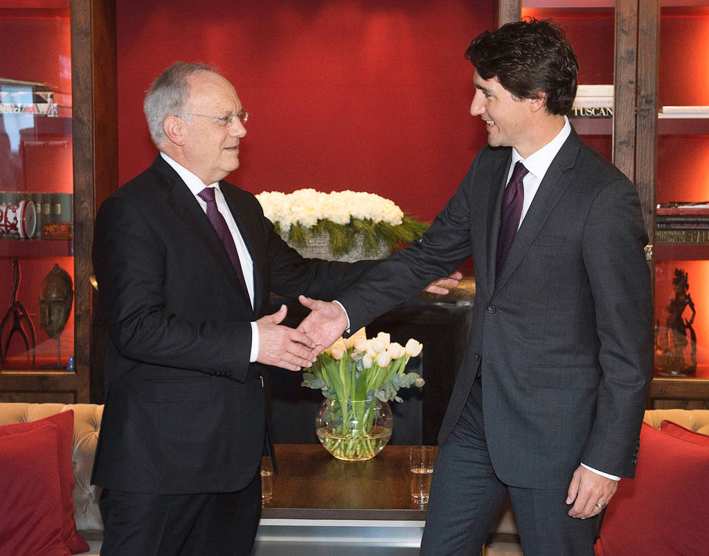 Johann Schneider-Ammann greets Justin Trudeau