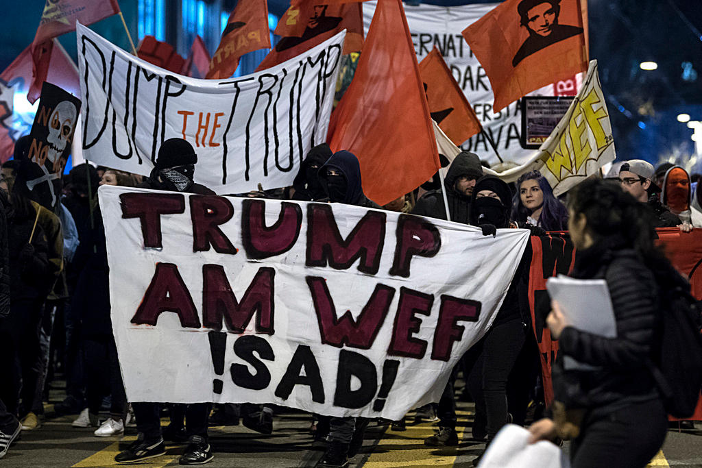 Anti-Trump protestors marching in Zurich