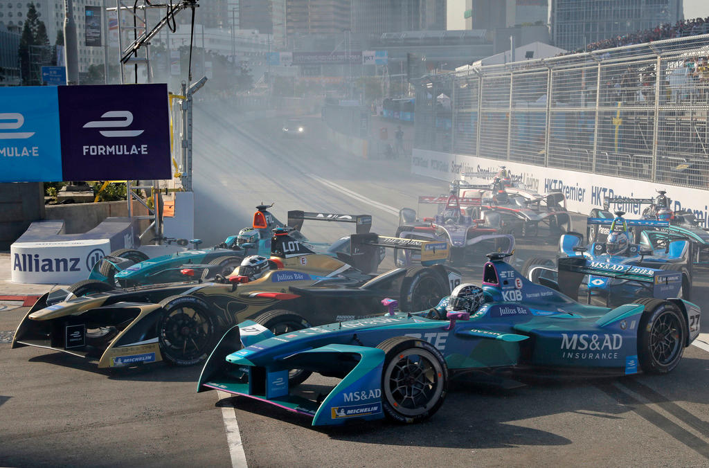Drivers compete in the Formula E Hong Kong ePrix auto race in Hong Kong on December 2, 2017