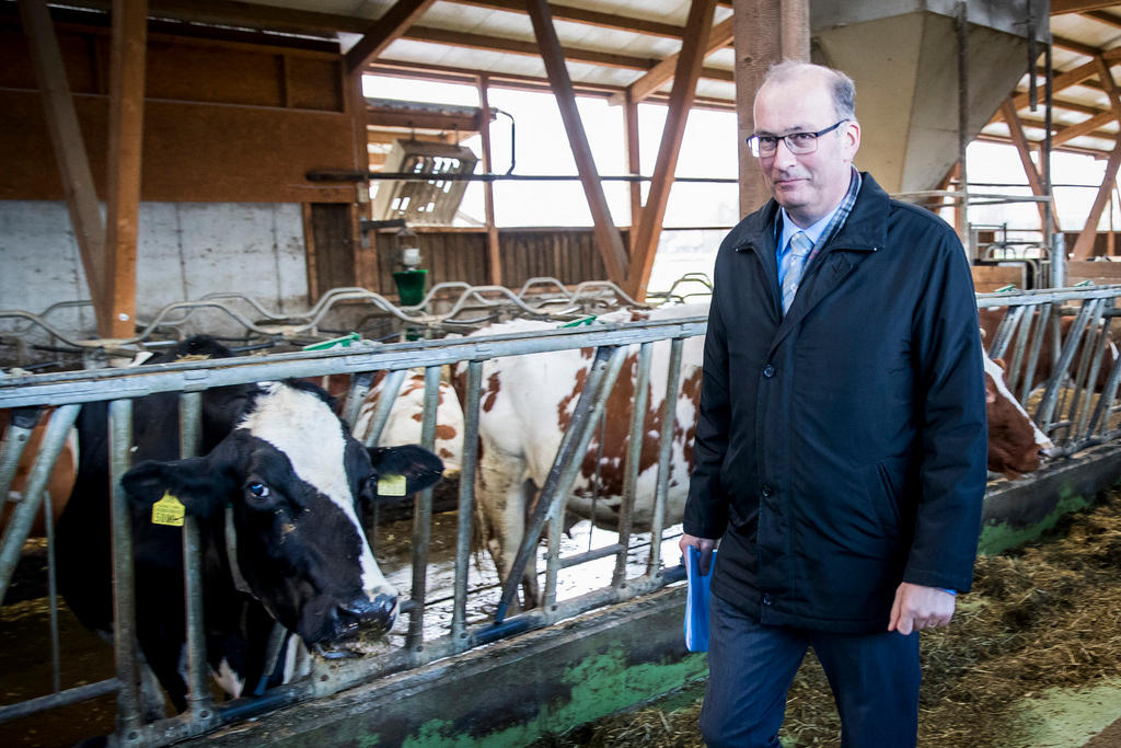 Markus Ritter, president of the Swiss Farmers Association in a modern cowshed