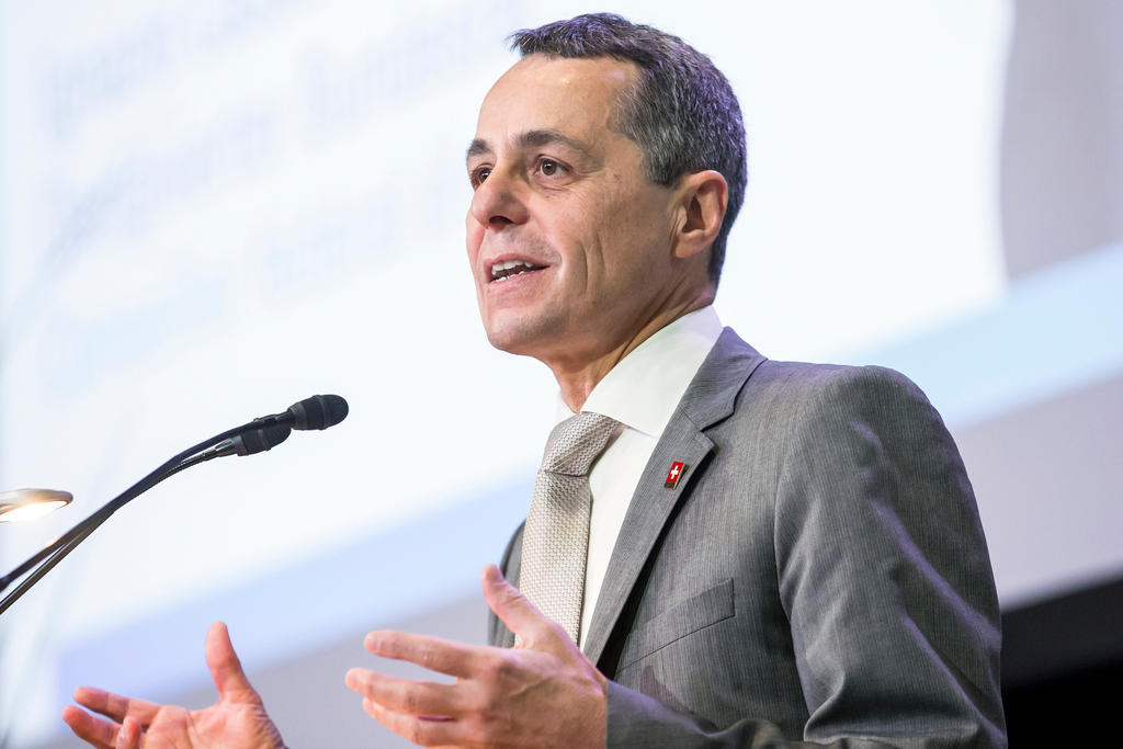 Swiss foreign affairs minister Ignazio Cassis giving a speech at a podium