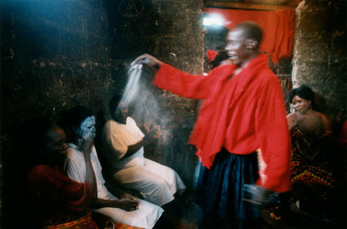 A voodoo priest practices the juju ritual in July 2003 in Benin City, Nigeria.