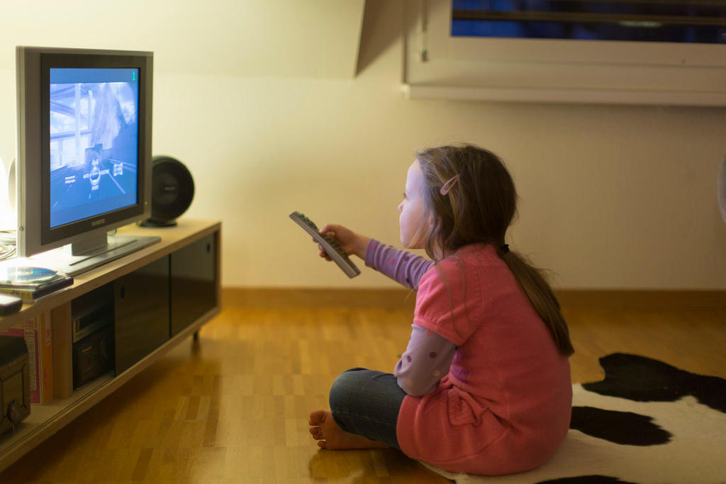 A girl watches television