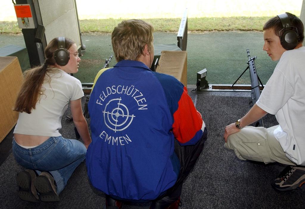 Young shooters at the Hueslenmoos shooting range near Emmenbruecke, canton Lucerne