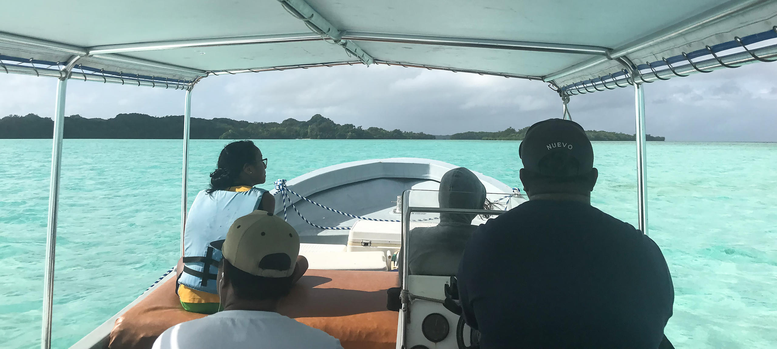 Post boat on its way to a small island