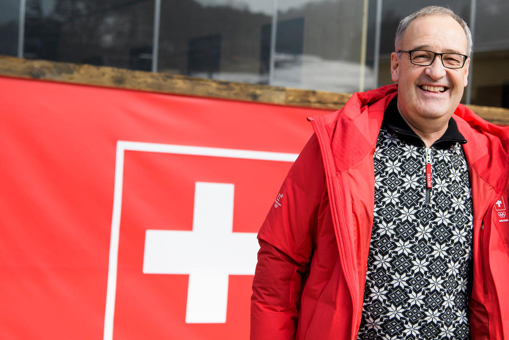 Guy Parmelin with big Swiss flag