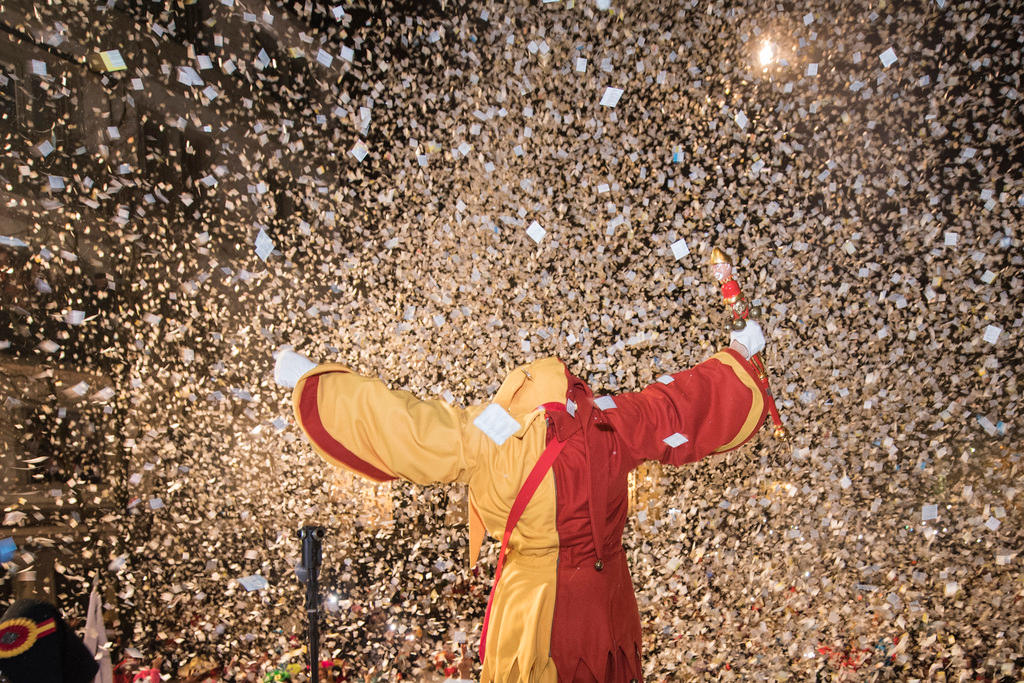 clown in confetti shower