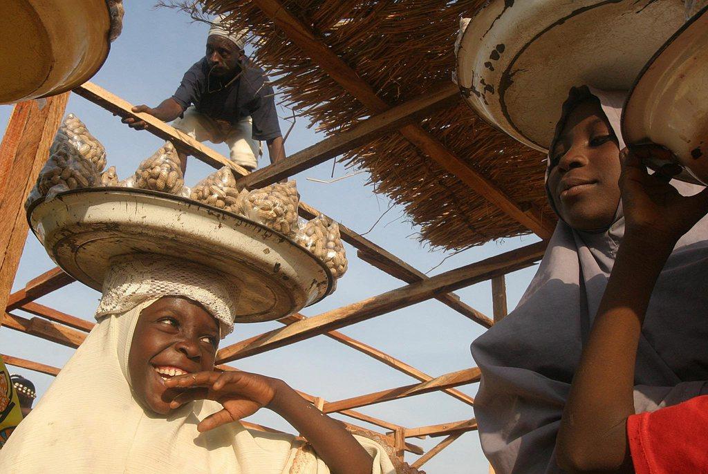 Young nigerian peanut sellers