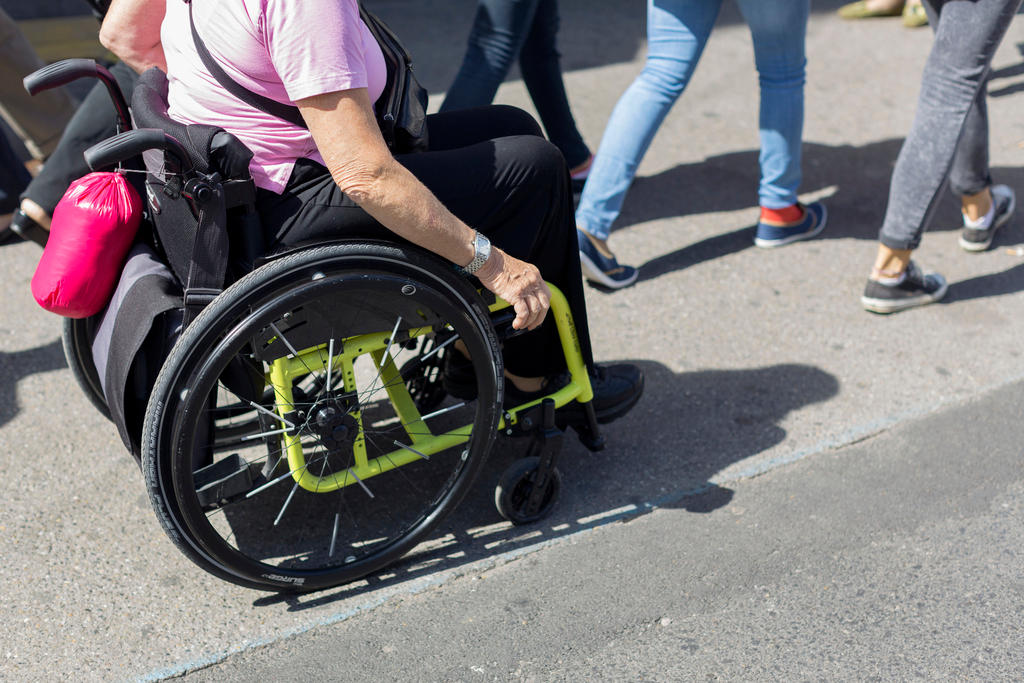 A picture of a woman in a wheelchair