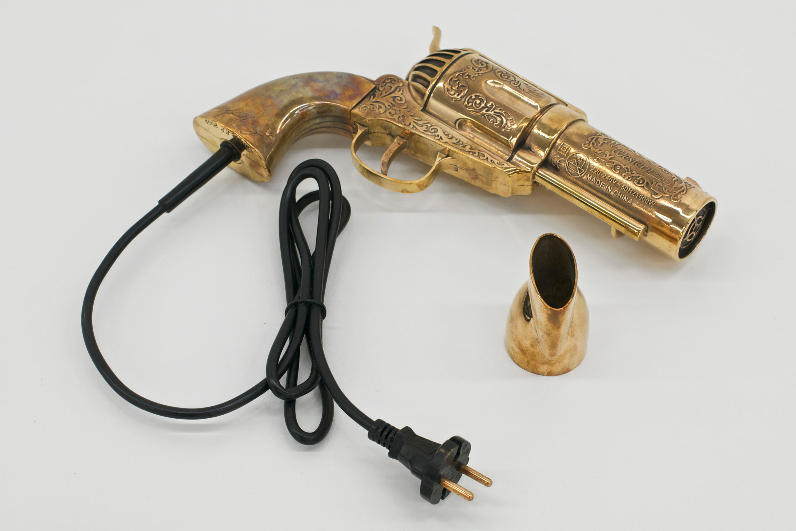 Haarföhn in Form eines Revolvers