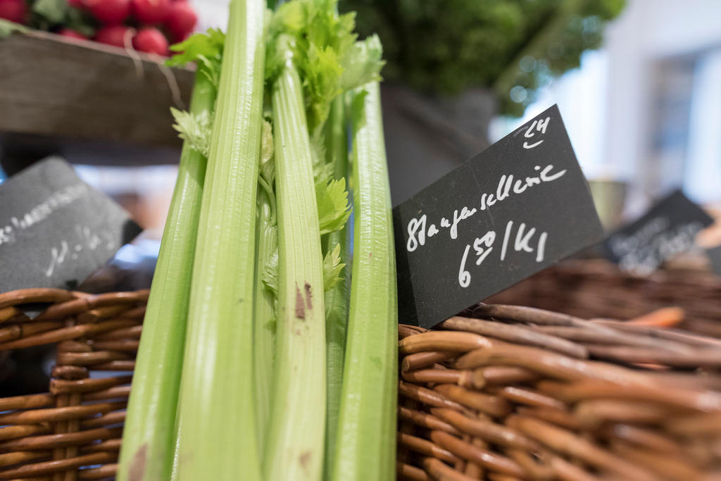Celery is offered for sale in a basket at the farm shop at Seefeld, pictured in Zurich, Switzerland, on December 11, 2017