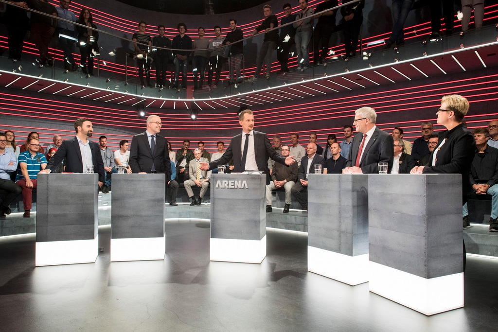 Arena discussion show on SRF television with five panelists and audience