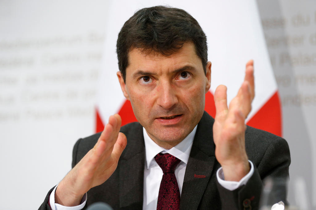 Jörg Gasser makes a point during a media conference