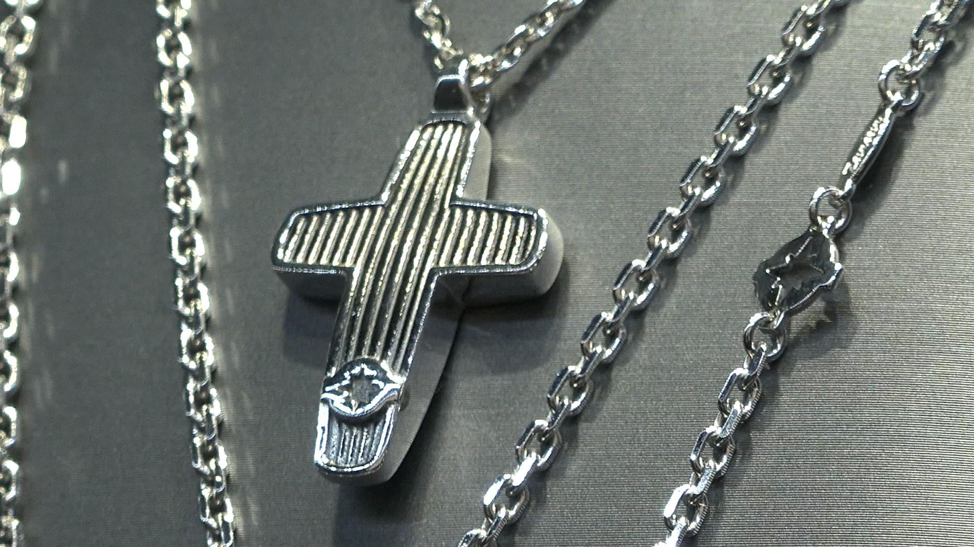 close up cross on chain
