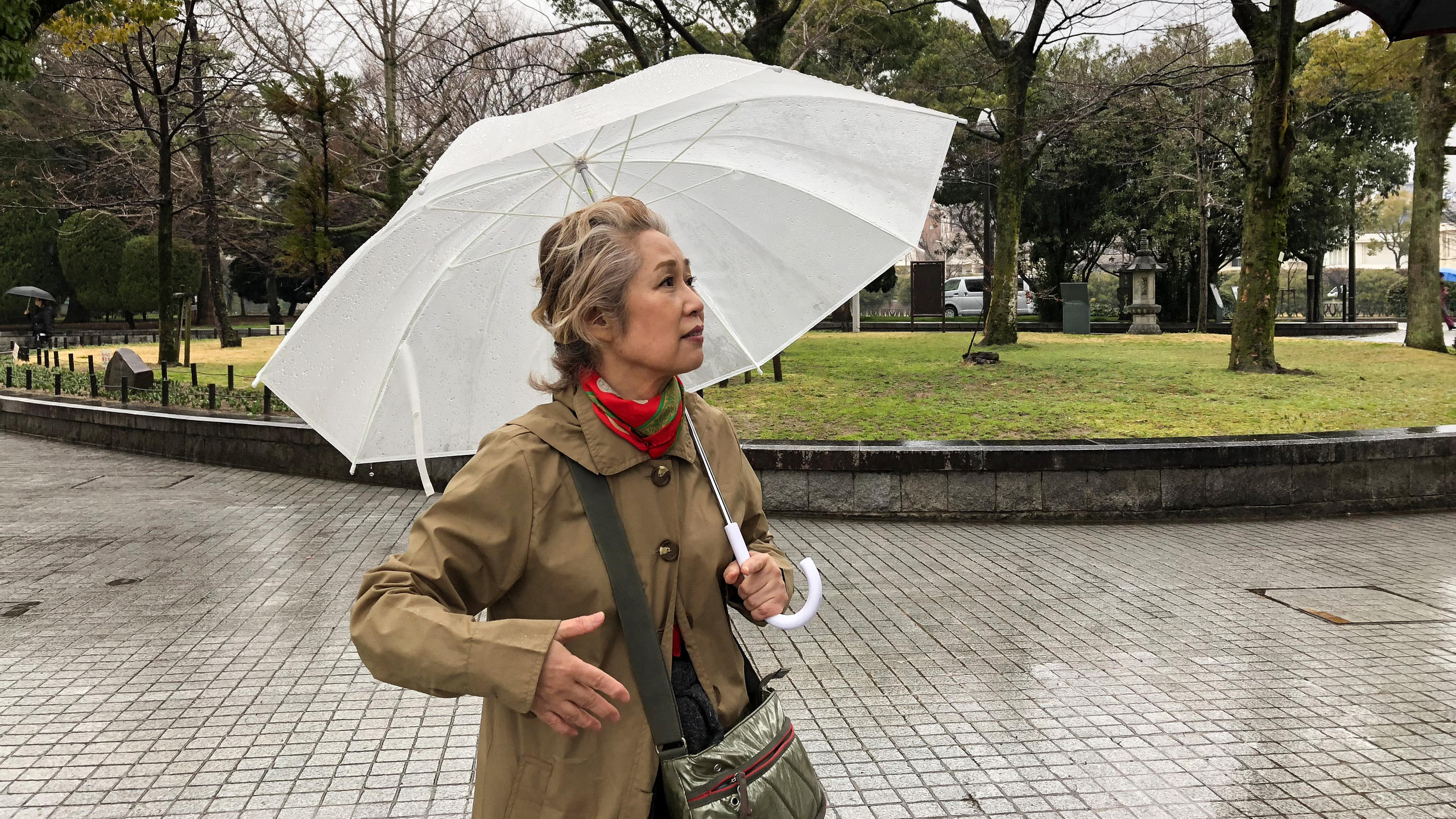 Reiko Hatsuya with white umbrella in Hiroshima