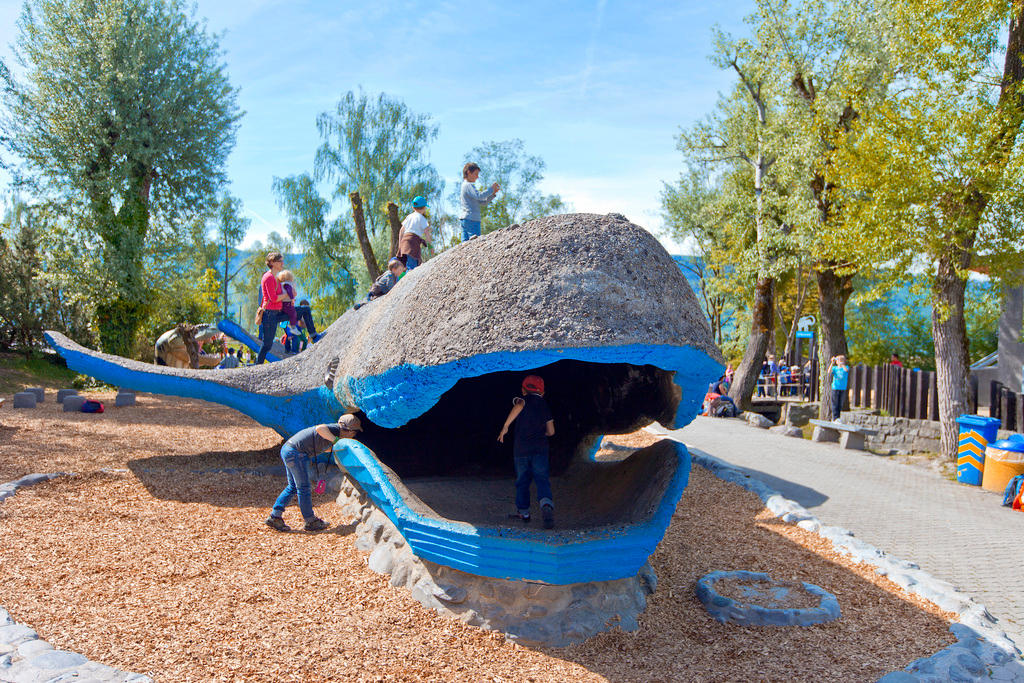 Children play with the concrete whale on the playground at the Knie children s zoo in Rapperswil