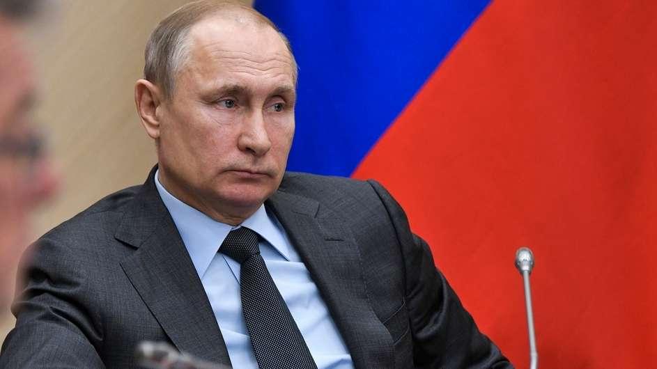 Путин
