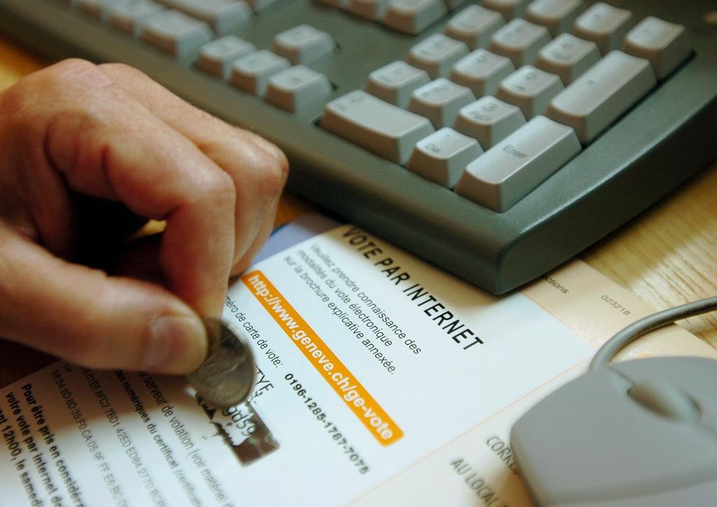 Computer keyboard, a hand and instructions for e-voting