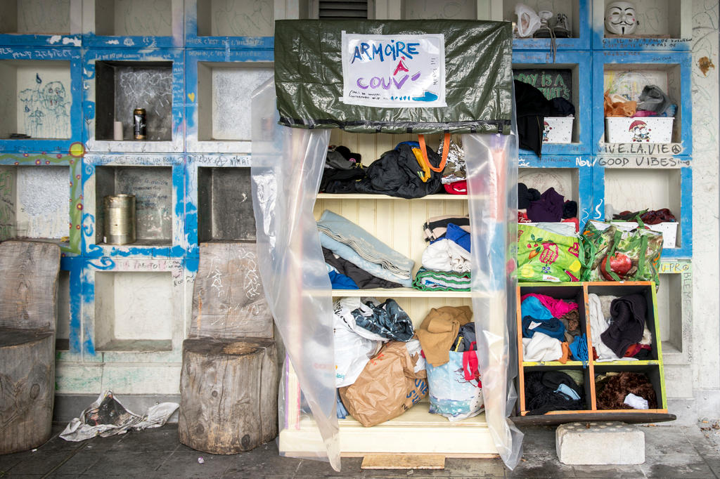 A picture of a wardrobe in the streets for homeless people to help themselves to blankets