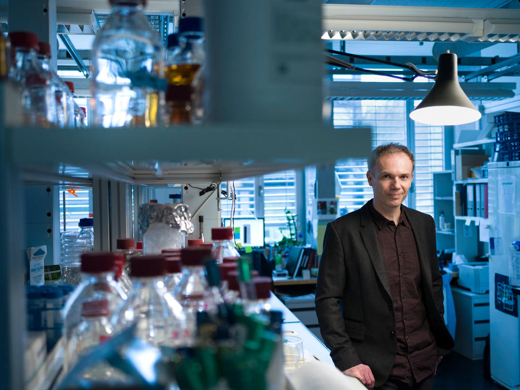 Nenad Ban holds a 3D model of a ribosomal subunit