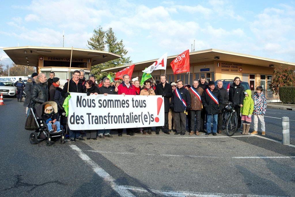Cross-border workers protesting at border