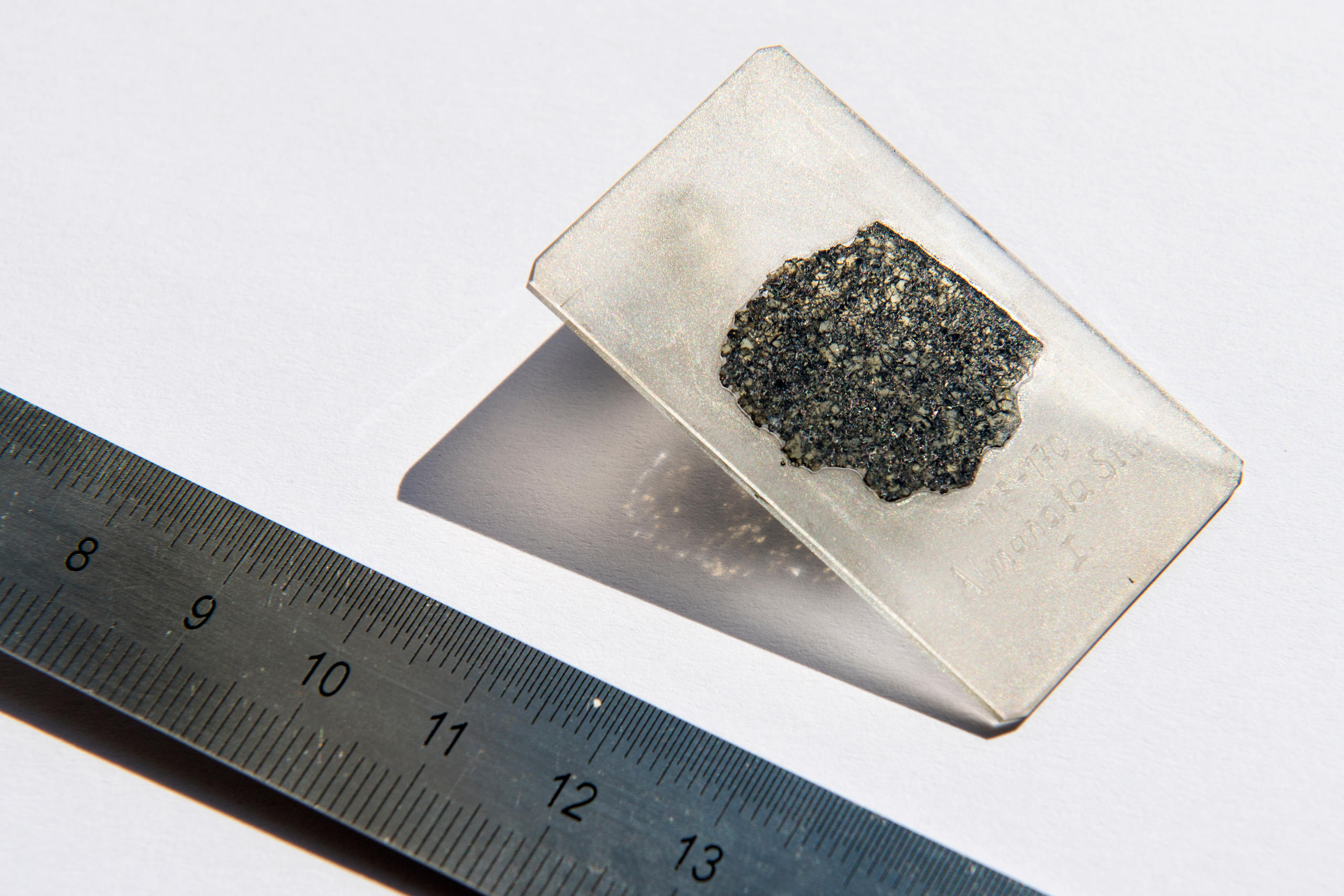 A thin slice of the meteorite sample used in the study.