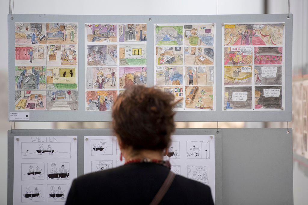 Looking at a comic exhibit