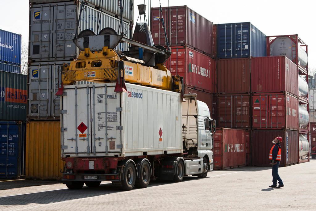 A truck has its container unloaded