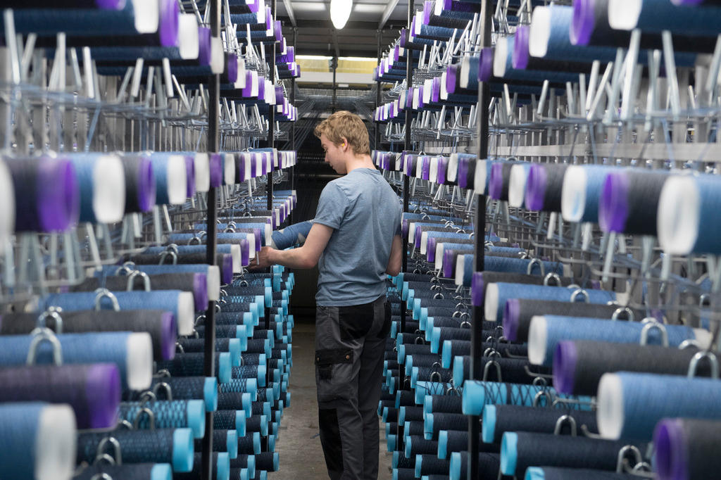 man with big spools