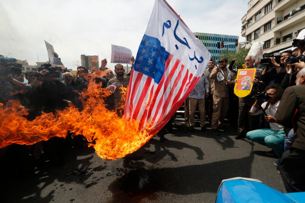 Protesters burn the US flag in Tehran
