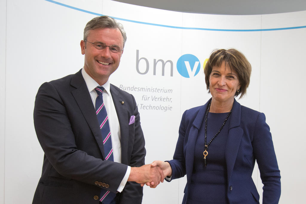 Doris Leuthard and Norbert Hofer shake hands in Vienna