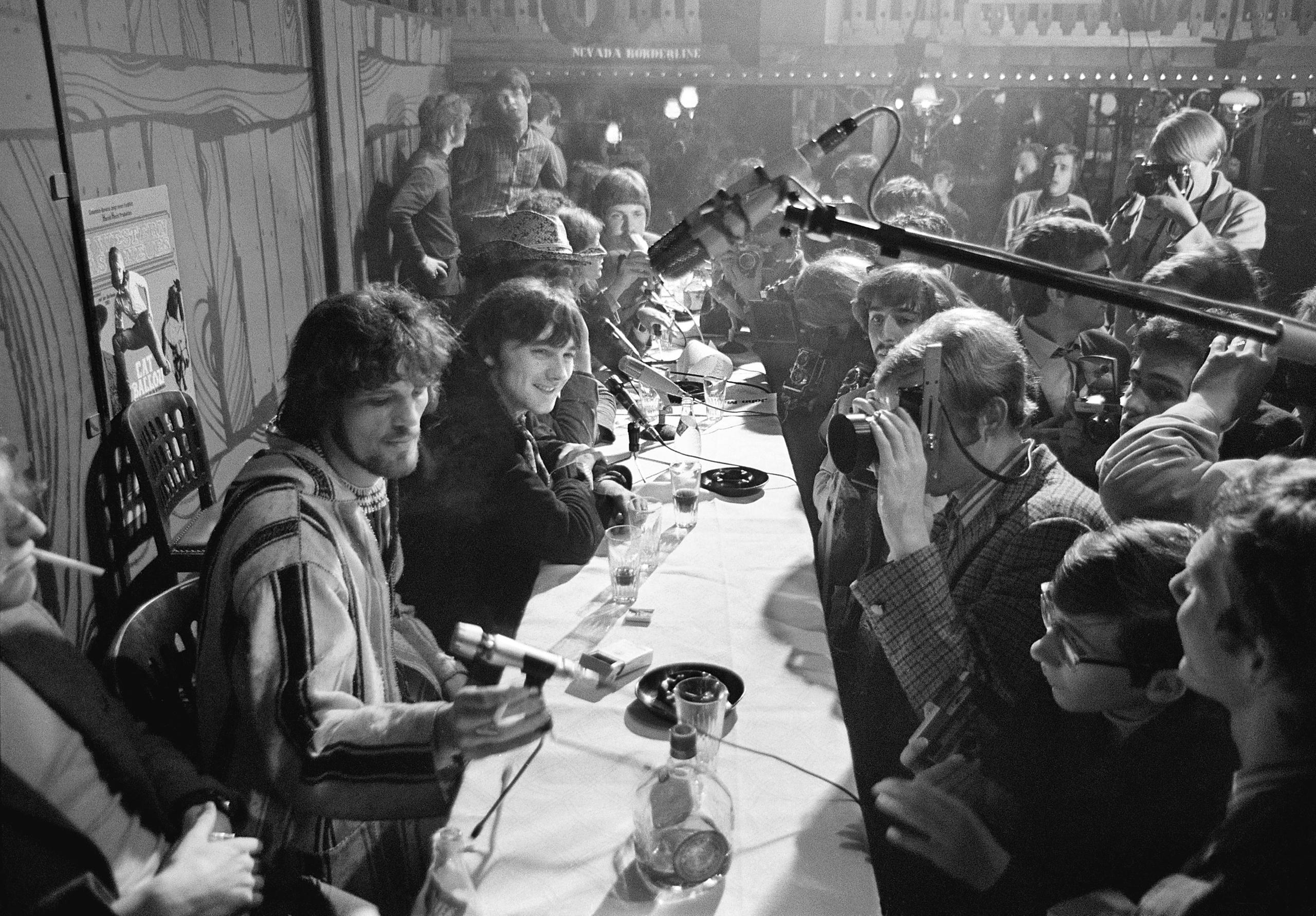 Musicians sitting at a table