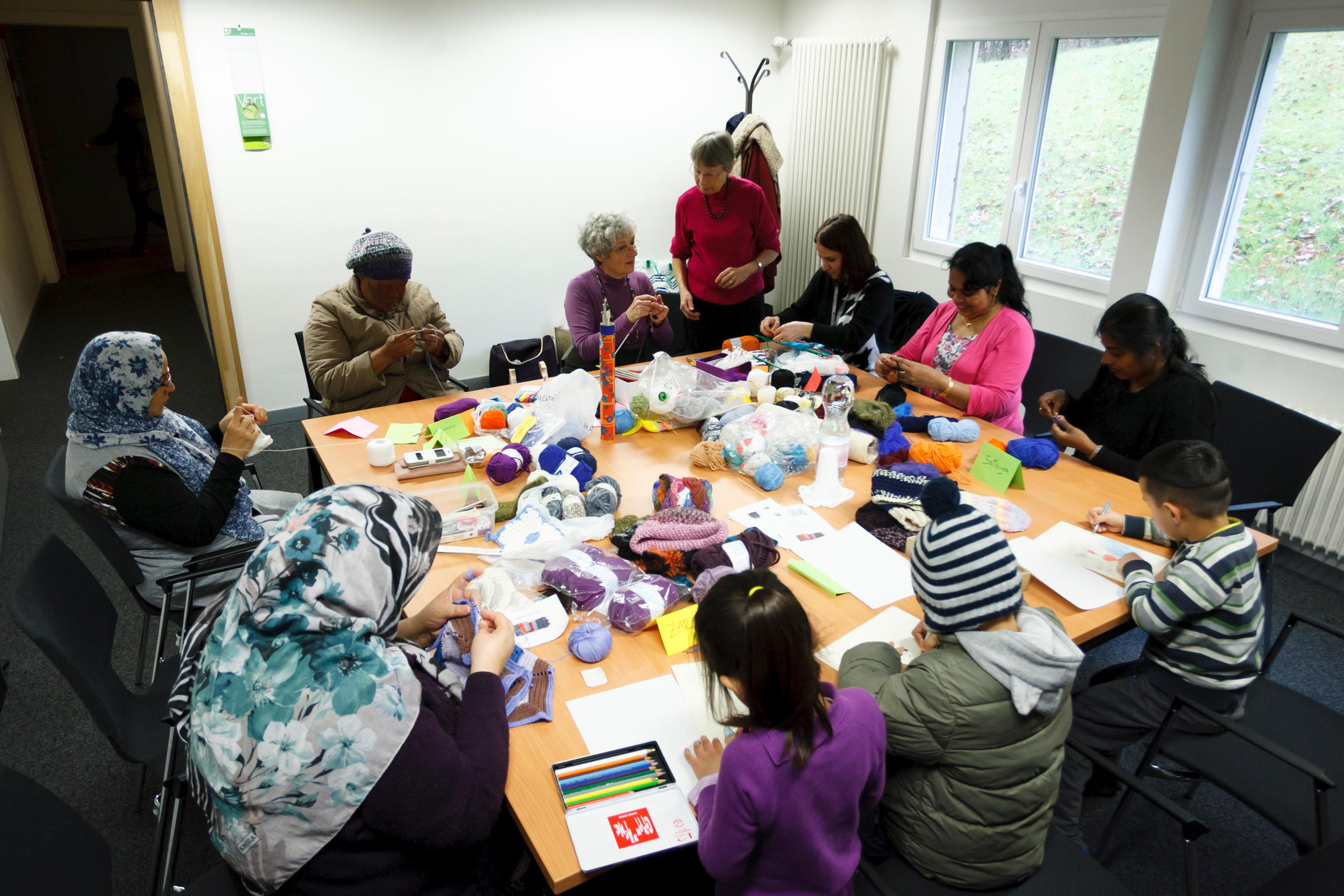 women asylum seekers in knitting workshop