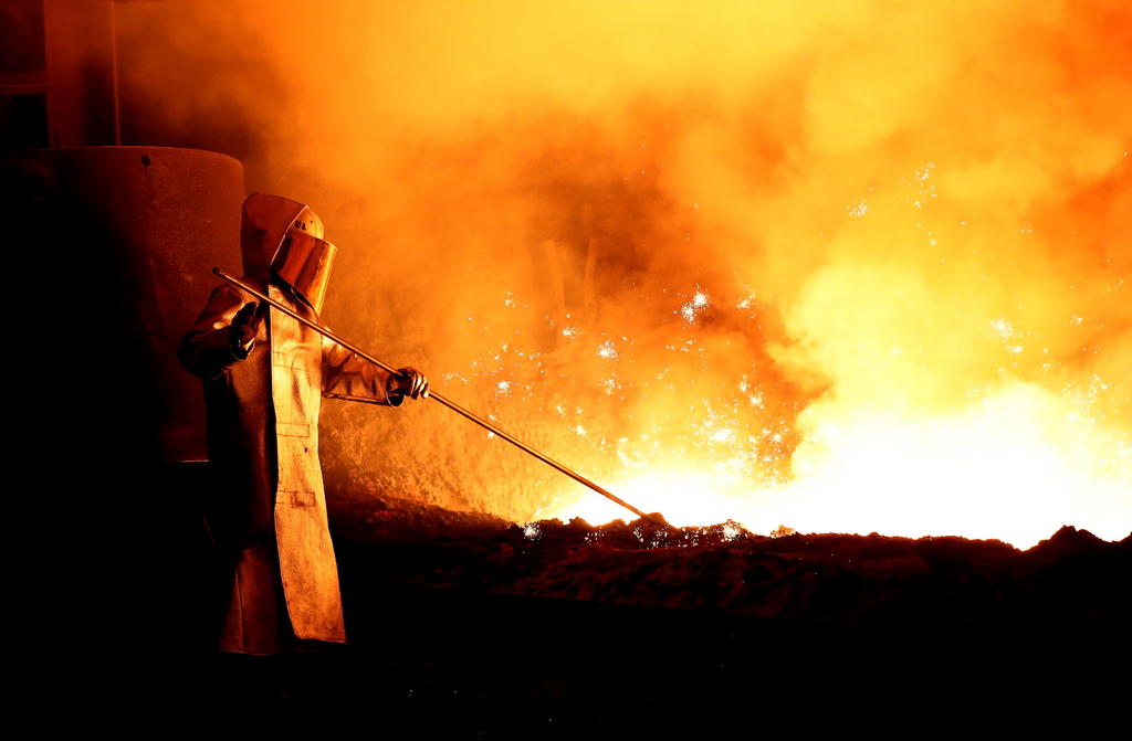 A worker at the German steel technology group Salzgitter AG in Salzgitter, Germany