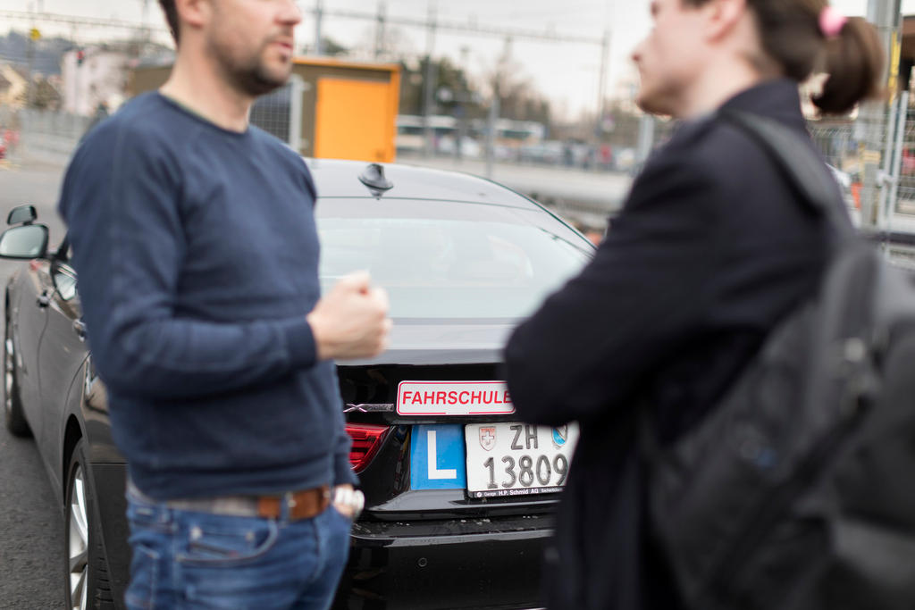 A driving instructor and pupil