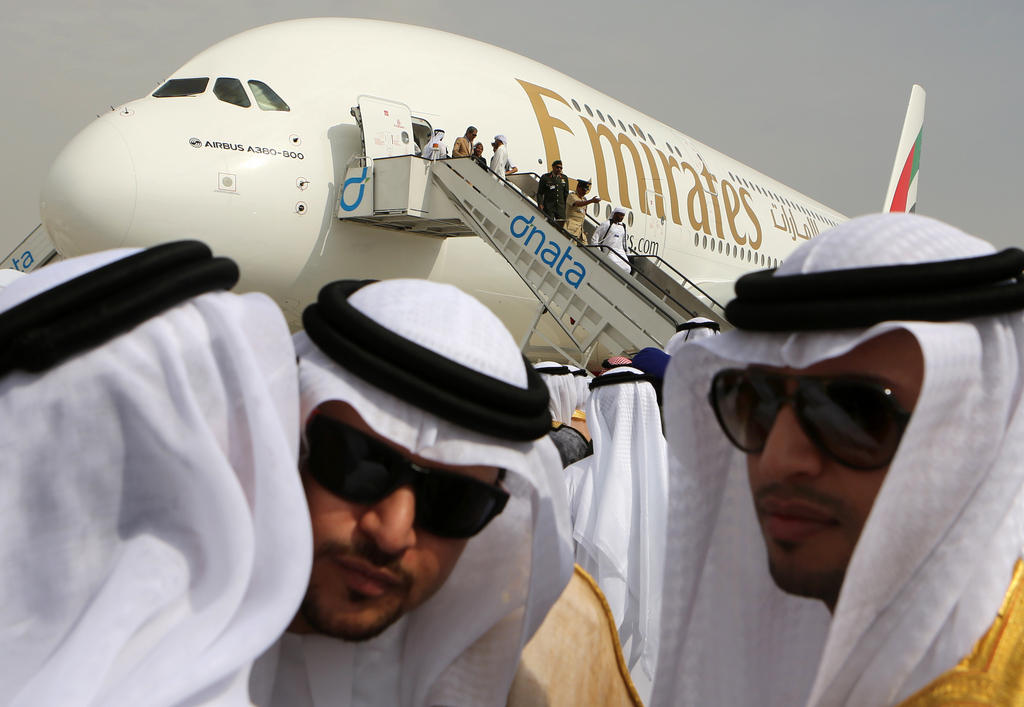 Middle Eastern men in sunglasses