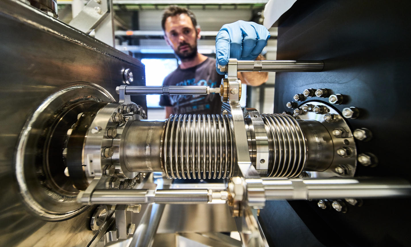 A CERN researcher works on radio-frequency cavities called crab cavities as part of the LHC High-Luminosity upgrade