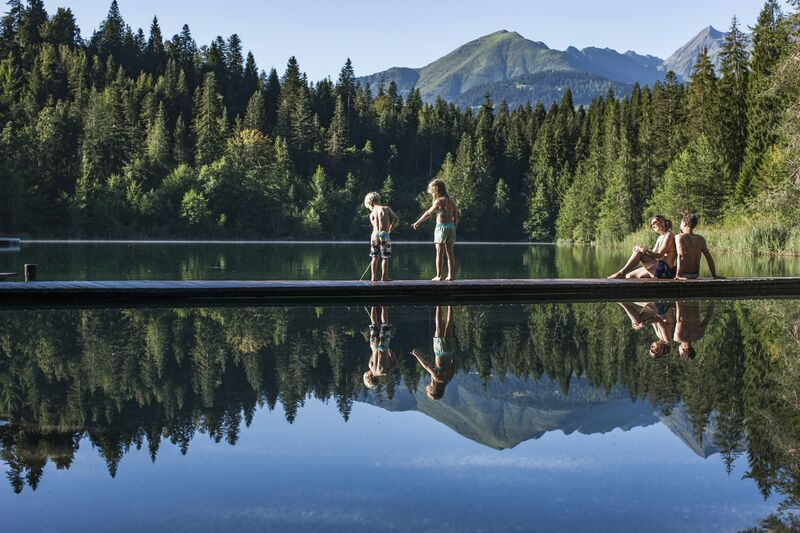 family by lake