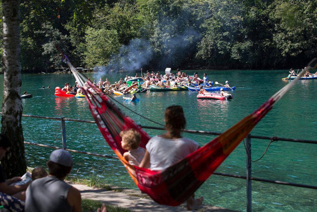 Inflatable boats down the Rhone River in Geneva