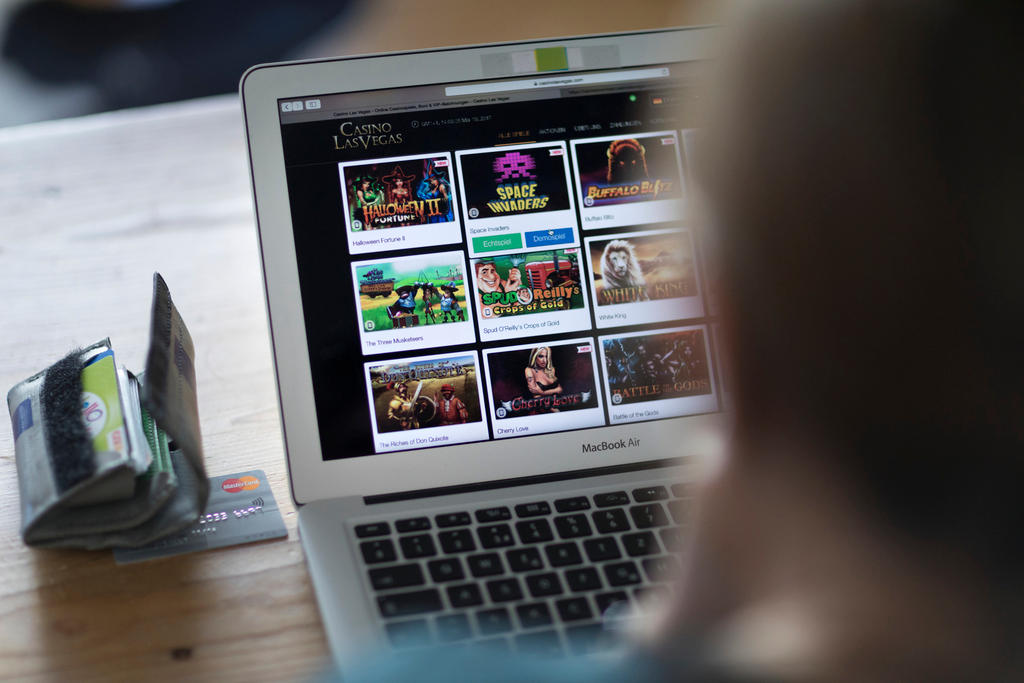 A picture of a person looking at an online gambling site