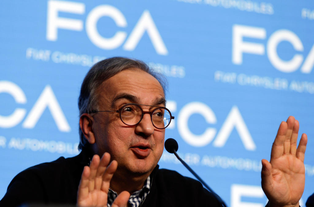 Marchionne e logo Fca