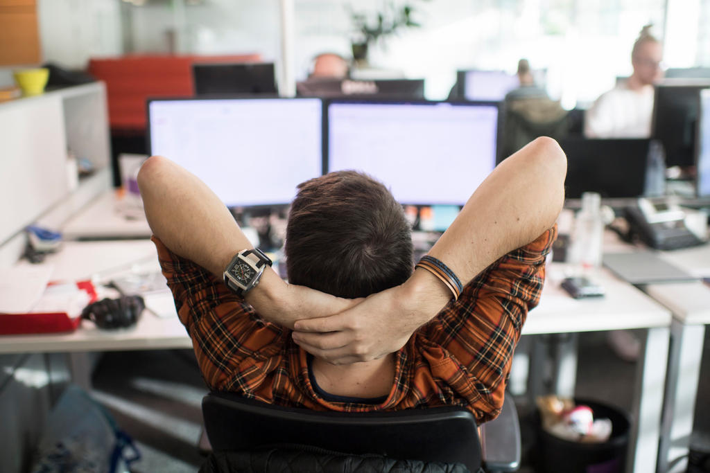 man sitting on chair in office