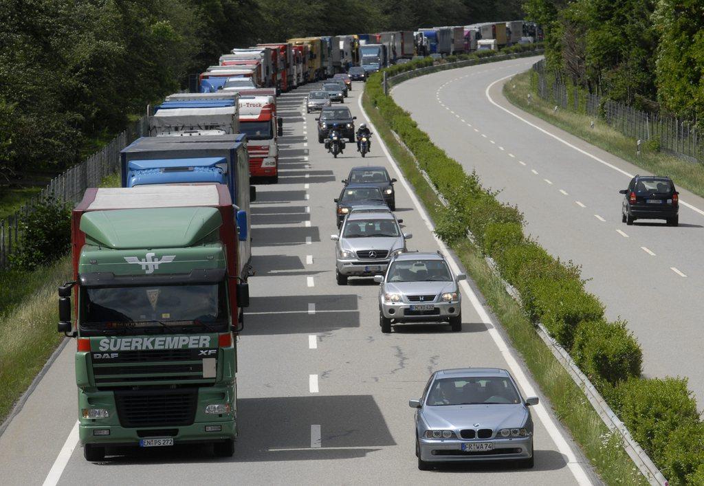 Trucks and cars are caught in a traffic jam on the highway A13 in northward direction to the San Bernardino tunnel