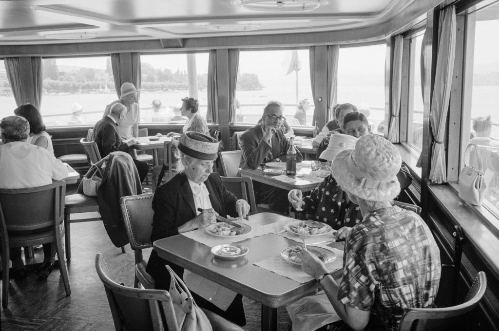 People eating a meal at the table in the ships restaurant