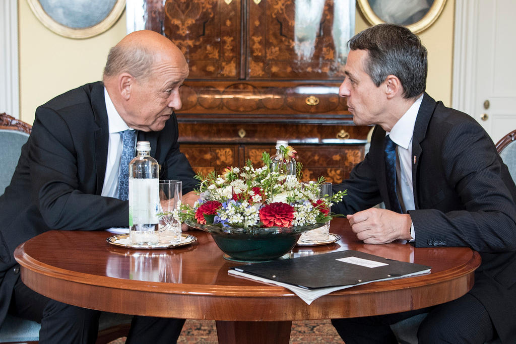 Ignazio Cassis, right, speaks with Jean-Yves Le Drian Europe-and Foreign Minister of France