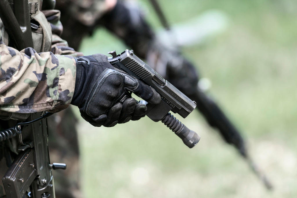 weapons training close up of hand with gun