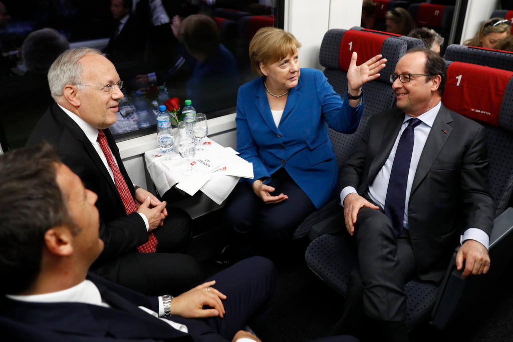 schneider amman with merkel and hollande