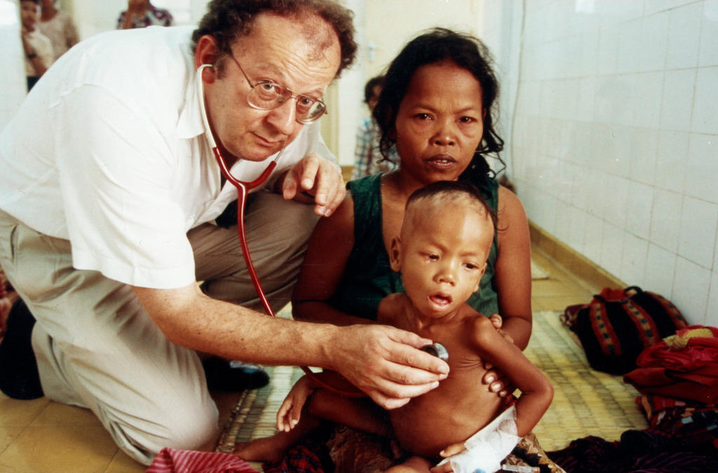 Beat Richner with sick Cambodian child and mother